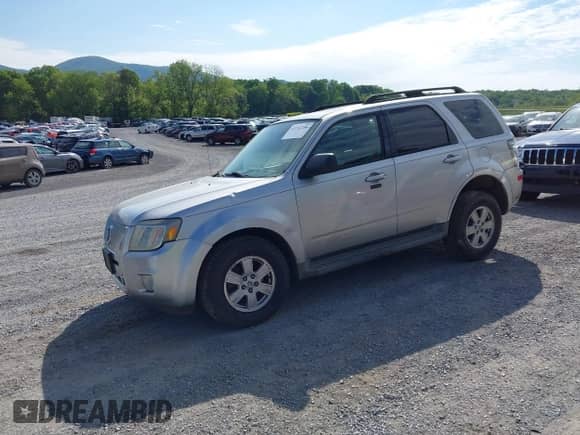 2010 Mercury Mariner with VIN 4M2CN9BG0AKJ21754, listed as a IAAI auction lot 42192286 with 196,749 mi miles and . Bid and sale history available at DreamBid. Image 18.