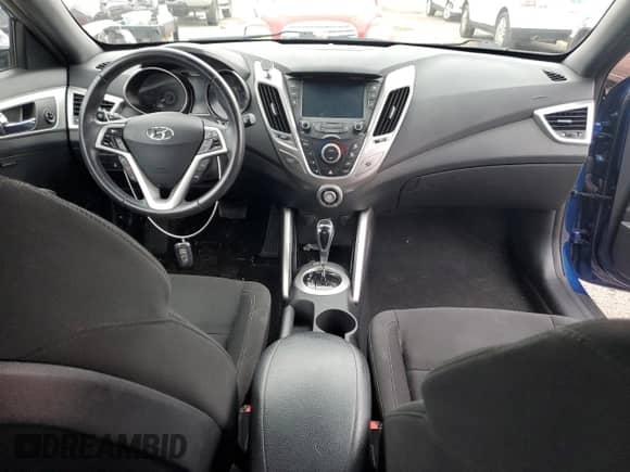 2017 Hyundai Veloster z VIN KMHTC6AD8HU324368, wystawiony jako Copart lot #37286853 z przebiegiem 90 777 mil mil oraz . Historia ofert i sprzedaży dostępna na DreamBid. Obrazek 8.