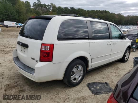 2009 Dodge Grand Caravan SE with VIN 2D8HN44E29R593219, listed as a Copart auction lot 85507595 with 202,155 mi miles and Salvage title. Bid and sale history available at DreamBid. Image 3.