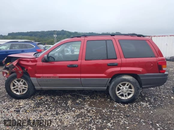 ✅ 2002 Jeep Grand Cherokee Laredo • VIN: 1J4GW48S82C316851 • Lot: 43260328. Listed on IAAI with 167,363 mi. Free auction sales archive from the USA and detailed vehicle history report at DreamBid. Image 15.
