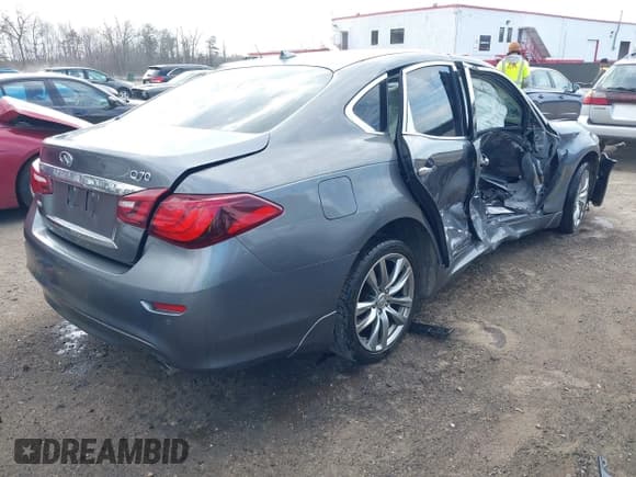 ✅ 2016 Infiniti Q70 • VIN: JN1BY1AR0GM270212 • Lot: 41889159. Listed on IAAI with 108,760 mi. Free auction sales archive from the USA and detailed vehicle history report at DreamBid. Image 4.