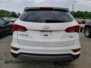 ✅ 2017 Hyundai Santa Fe 2.4L • VIN: 5XYZUDLB9HG445150 • Лот: 56042064. Опубликован ранее на Copart с пробегом 100 897 миль. Бесплатный доступ к архиву аукционных продаж из США и подробный отчёт об истории автомобиля на DreamBid. Изображение 6.