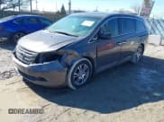 ✅ 2012 Honda Odyssey EX-L • VIN: 5FNRL5H61CB095761 • Lot: 41647368. Listed on IAAI with 146,661 mi. Free auction sales archive from the USA and detailed vehicle history report at DreamBid. Image 2.