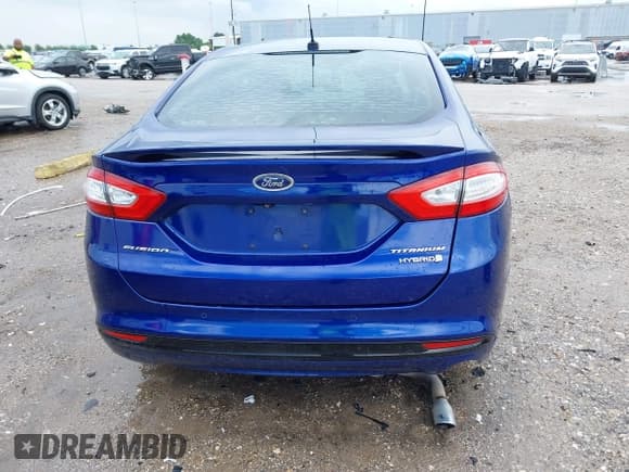 ✅ 2015 Ford Fusion Titanium Hybrid • VIN: 3FA6P0RUXFR126960 • Lot: 42420787. Wystawiony na IAAI z przebiegiem 161 114 mil. Bezpłatny archiwum sprzedaży aukcyjnych z USA i szczegółowy raport historii pojazdu na DreamBid. Zdjęcie 16.