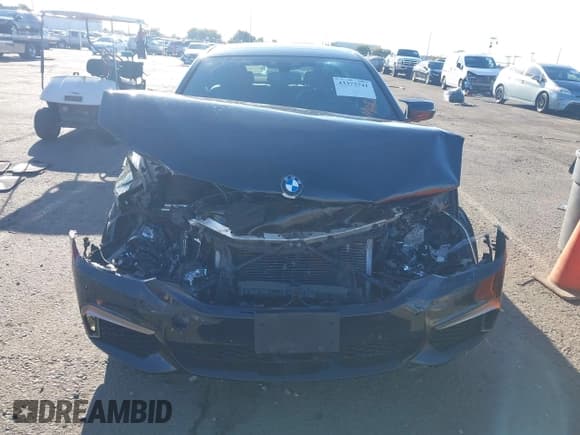 ✅ 2018 BMW 5 Series M550i xDrive • VIN: WBAJB9C50JB035182 • Лот: 43373741. Опубликован ранее на IAAI с пробегом Не указан. Бесплатный доступ к архиву аукционных продаж из США и подробный отчёт об истории автомобиля на DreamBid. Изображение 6.