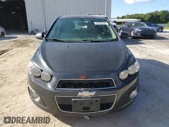 2015 Chevrolet Sonic LT с VIN 1G1JC6SH8F4160395, выставлен на аукционе Copart как лот 69250224 с пробегом 118 783 миль миль и Списание • Salvage title. История ставок и продаж доступна на DreamBid. Изображение 5.