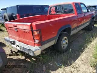 1996 Dodge Dakota z VIN 1B7GG23X1TS537628, wystawiony jako Copart lot #67980544 z przebiegiem 239 132 mil mil oraz Szkoda całkowita • Salvage title. Historia ofert i sprzedaży dostępna na DreamBid. Obrazek 3.