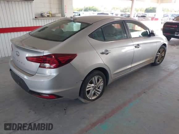 ✅ 2020 Hyundai Elantra SEL • VIN: 5NPD84LF6LH551557 • Lot: 43596930. Listed on IAAI with 103,939 mi. Free auction sales archive from the USA and detailed vehicle history report at DreamBid. Image 4.
