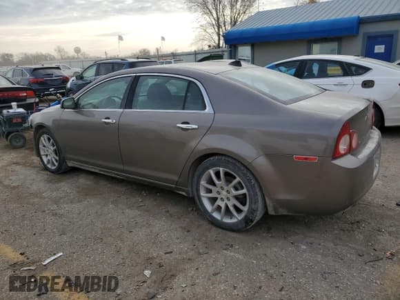 ✅ 2012 Chevrolet Malibu LTZ • VIN: 1G1ZE5EU7CF157570 • Lot: 82427004. Listed on Copart with 152,932 mi. Free auction sales archive from the USA and detailed vehicle history report at DreamBid. Image 2.