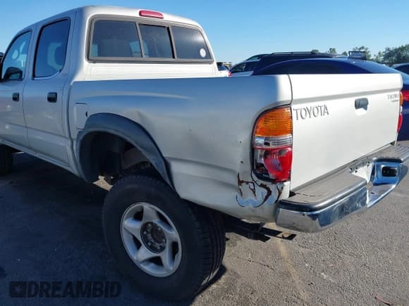 ✅ 2002 Toyota Tacoma PreRunner • VIN: 5TEGM92N02Z100943 • Lot: 43786389. Listed on IAAI with 280,855 mi. Free auction sales archive from the USA and detailed vehicle history report at DreamBid. Image 6.