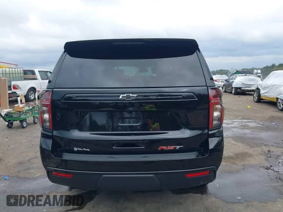 2024 Chevrolet Tahoe RST z VIN 1GNSCRKD0RR302733, wystawiony jako IAAI lot #40800083 z przebiegiem 10 597 mil mil oraz . Historia ofert i sprzedaży dostępna na DreamBid. Obrazek 17.