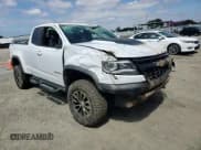 ✅ 2018 Chevrolet Colorado 4WD ZR2 • VIN: 1GCRTEEN5J1272992 • Лот: 50938455. Опубликован ранее на Copart с пробегом 62 191 миль. Бесплатный доступ к архиву аукционных продаж из США и подробный отчёт об истории автомобиля на DreamBid. Изображение 10.