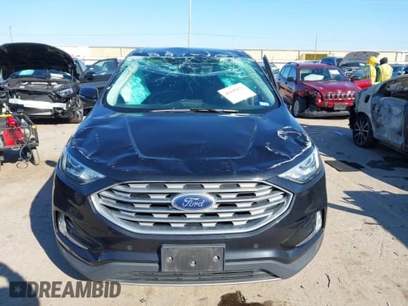 ✅ 2021 Ford Edge Titanium • VIN: 2FMPK3K97MBA35897 • Lot: 41629471. Wystawiony na IAAI z przebiegiem 55 647 mil. Bezpłatny archiwum sprzedaży aukcyjnych z USA i szczegółowy raport historii pojazdu na DreamBid. Zdjęcie 13.