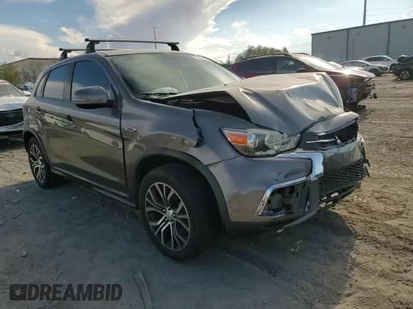 2019 Mitsubishi Outlander ES z VIN JA4AP3AU7KU027785, wystawiony jako Copart lot #71932825 z przebiegiem 63 159 mil mil oraz Szkoda całkowita • Salvage title. Historia ofert i sprzedaży dostępna na DreamBid. Obrazek 13.