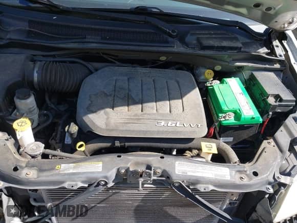 2012 Dodge Grand Caravan SXT z VIN 2C4RDGCG9CR357748, wystawiony jako IAAI lot #43318031 z przebiegiem 79 308 mil mil oraz . Historia ofert i sprzedaży dostępna na DreamBid. Obrazek 10.