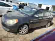 2007 Hyundai Accent GLS z VIN KMHCN46C17U094735, wystawiony jako Copart lot #81481014 z przebiegiem 50 579 mil mil oraz Czysty tytuł • Clean title. Historia ofert i sprzedaży dostępna na DreamBid. Obrazek 1.