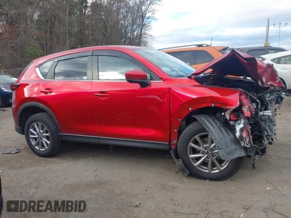 ✅ 2022 Mazda CX-5 S Preferred • VIN: JM3KFBCM5N0573346 • Lot: 43732540. Listed on IAAI with 48,112 mi. Free auction sales archive from the USA and detailed vehicle history report at DreamBid. Image 13.