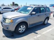 ✅ 2008 Ford Escape XLS • VIN: 1FMCU02Z68KE49322 • Lot: 42818502. Listed on IAAI with 154,099 mi. Free auction sales archive from the USA and detailed vehicle history report at DreamBid. Image 2.