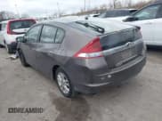 ✅ 2013 Honda Insight EX • VIN: JHMZE2H73DS006700 • Lot: 43779001. Listed on IAAI with 154,151 mi. Free auction sales archive from the USA and detailed vehicle history report at DreamBid. Image 3.