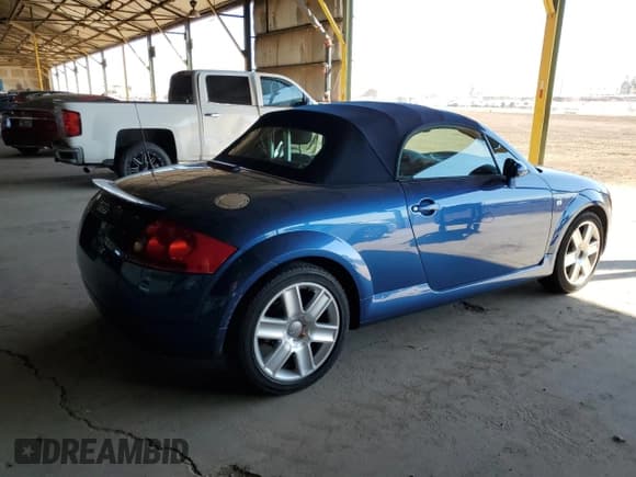 ✅ 2003 Audi TT • VIN: TRUTC28N731009718 • Lot: 82021075. Listed on Copart with 70,262 mi. Free auction sales archive from the USA and detailed vehicle history report at DreamBid. Image 3.