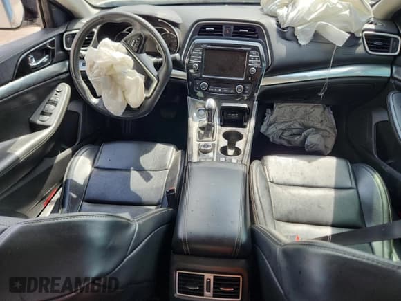 ✅ 2019 Nissan Maxima Platinum • VIN: 1N4AA6AV5KC371631 • Lot: 64587135. Wystawiony na Copart z przebiegiem 97 794 mil. Bezpłatny archiwum sprzedaży aukcyjnych z USA i szczegółowy raport historii pojazdu na DreamBid. Zdjęcie 8.