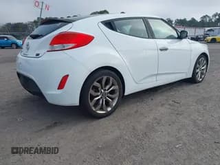 ✅ 2014 Hyundai Veloster • VIN: KMHTC6ADXEU213073 • Lot: 41551346. Wystawiony na IAAI z przebiegiem 130 549 mil. Bezpłatny archiwum sprzedaży aukcyjnych z USA i szczegółowy raport historii pojazdu na DreamBid. Zdjęcie 4.