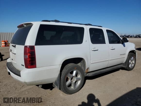 ✅ 2011 Chevrolet Suburban LT • VIN: 1GNSKJE38BR139813 • Lot: 82637335. Listed on Copart with 222,237 mi. Free auction sales archive from the USA and detailed vehicle history report at DreamBid. Image 3.