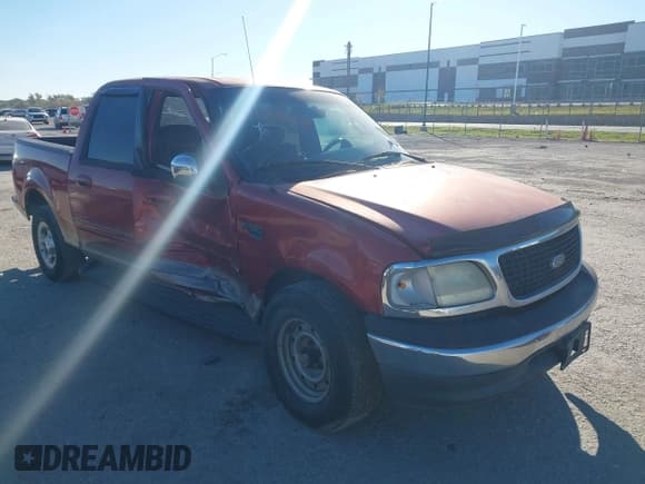 ✅ 2001 Ford F-150 XLT • VIN: 1FTRW07LX1KF76044 • Lot: 43570682. Listed on IAAI with 241,312 mi. Free auction sales archive from the USA and detailed vehicle history report at DreamBid. Image 1.