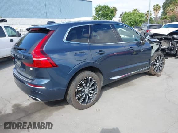 ✅ 2021 Volvo XC60 Inscription Expression • VIN: YV4BR0DL5M1820896 • Lot: 42207370. Listed on IAAI with 58,670 mi. Free auction sales archive from the USA and detailed vehicle history report at DreamBid. Image 4.