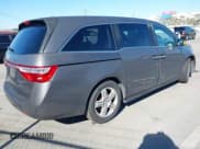 ✅ 2012 Honda Odyssey Touring • VIN: 5FNRL5H94CB106763 • Лот: 43309470. Опубликован ранее на IAAI с пробегом 154 794 миль. Бесплатный доступ к архиву аукционных продаж из США и подробный отчёт об истории автомобиля на DreamBid. Изображение 4.