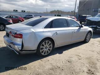 ✅ 2015 Audi A8 3.0T • VIN: WAU3GAFD6FN013868 • Лот: 40823394. Опубликован ранее на Copart с пробегом 134 073 миль. Бесплатный доступ к архиву аукционных продаж из США и подробный отчёт об истории автомобиля на DreamBid. Изображение 3.