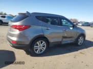 ✅ 2015 Hyundai Santa Fe • VIN: 5XYZWDLA3FG275477 • Lot: 91077545. Listed on Copart with 123,224 mi. Free auction sales archive from the USA and detailed vehicle history report at DreamBid. Image 3.