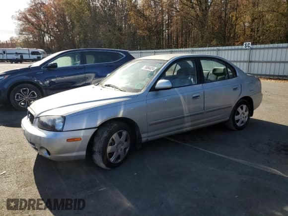 2001 Hyundai Elantra GLS z VIN KMHDN45D71U057338, wystawiony jako Copart lot #79084024 z przebiegiem 137 887 mil mil oraz Szkoda całkowita • Salvage title. Historia ofert i sprzedaży dostępna na DreamBid. Obrazek 1.