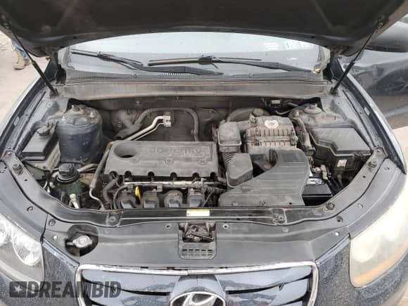 2011 Hyundai Santa Fe GLS z VIN 5XYZGDAB0BG004590, wystawiony jako Copart lot #72432574 z przebiegiem 245 132 mil mil oraz Szkoda całkowita • Salvage title. Historia ofert i sprzedaży dostępna na DreamBid. Obrazek 12.