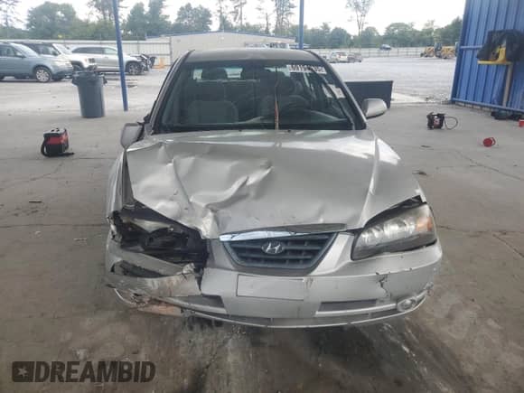 2004 Hyundai Elantra GLS with VIN KMHDN46D14U773672, listed as a Copart auction lot 69194635 with 189,128 mi miles and Salvage title. Bid and sale history available at DreamBid. Image 5.