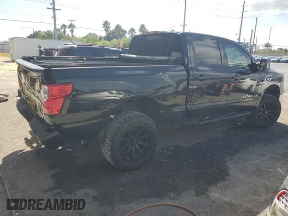 ✅ 2017 Nissan Titan SV • VIN: 1N6AA1F23HN549400 • Lot: 90404455. Listed on Copart with 56,050 mi. Free auction sales archive from the USA and detailed vehicle history report at DreamBid. Image 3.