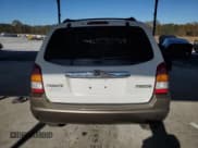 ✅ 2004 Mazda Tribute LX • VIN: 4F2YZ04184KM17467 • Lot: 84697684. Listed on Copart with 287,299 mi. Free auction sales archive from the USA and detailed vehicle history report at DreamBid. Image 6.