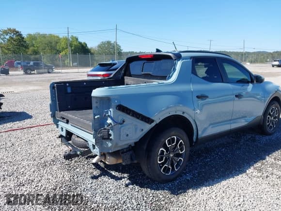 ✅ 2023 Hyundai Santa Cruz SEL • VIN: 5NTJCDAE7PH058098 • Лот: 43359560. Опубликован ранее на IAAI с пробегом 31 877 миль. Бесплатный доступ к архиву аукционных продаж из США и подробный отчёт об истории автомобиля на DreamBid. Изображение 4.