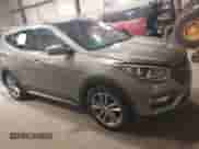 2017 Hyundai Santa Fe 2.0T z VIN 5XYZUDLA4HG424259, wystawiony jako IAAI lot #42657783 z przebiegiem 213 040 mil mil oraz . Historia ofert i sprzedaży dostępna na DreamBid. Obrazek 13.