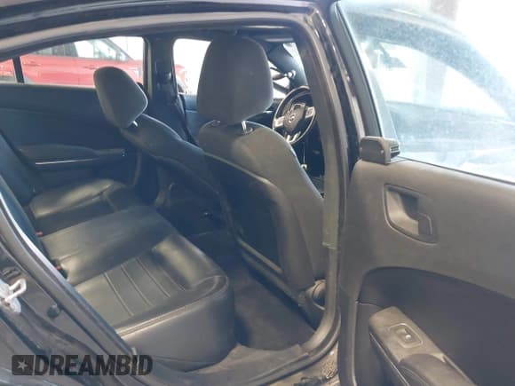 ✅ 2013 Dodge Charger Police • VIN: 2C3CDXATXDH673712 • Lot: 42487574. Listed on IAAI with 134,775 mi. Free auction sales archive from the USA and detailed vehicle history report at DreamBid. Image 8.