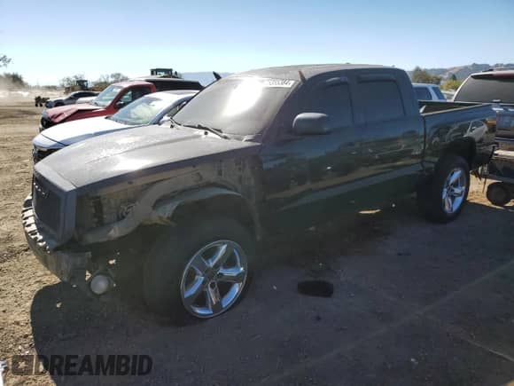 2007 Dodge Dakota SLT z VIN 1D7HW48J07S241356, wystawiony jako Copart lot #75355384 z przebiegiem 207 020 mil mil oraz Szkoda całkowita • Salvage title. Historia ofert i sprzedaży dostępna na DreamBid. Obrazek 1.