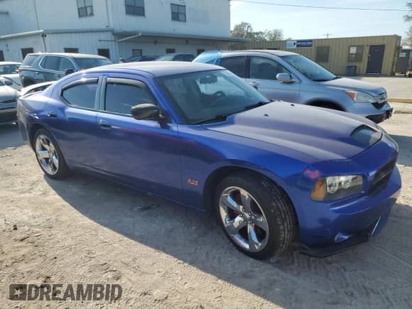 2006 Dodge Charger R/T with VIN 2B3KA53H76H521937, listed as a Copart auction lot 77455534 with 103,060 mi miles and Salvage title. Bid and sale history available at DreamBid. Image 4.