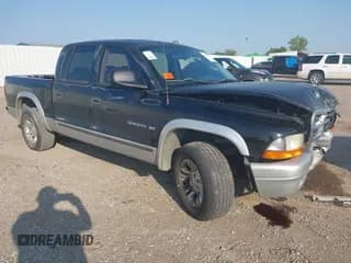✅ 2002 Dodge Dakota SLT • VIN: 1B7HL48N32S522887 • Lot: 43107391. Wystawiony na IAAI z przebiegiem 149 561 mil. Bezpłatny archiwum sprzedaży aukcyjnych z USA i szczegółowy raport historii pojazdu na DreamBid. Zdjęcie 1.