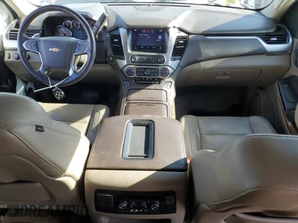 2015 Chevrolet Tahoe LTZ with VIN 1GNSKCKC1FR118128, listed as a Copart auction lot 89589135 with 129,932 mi miles and Salvage title. Bid and sale history available at DreamBid. Image 8.