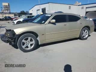 2010 Dodge Charger SXT с VIN 2B3CA3CV9AH152585, выставлен на аукционе Copart как лот 80866734 с пробегом 157 814 миль миль и Списание • Salvage title. История ставок и продаж доступна на DreamBid. Изображение 1.