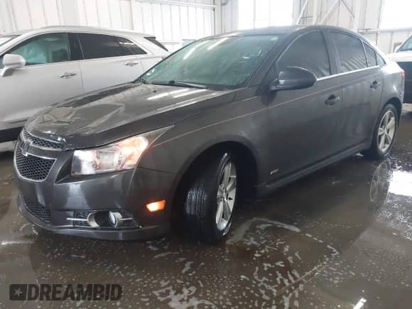 2014 Chevrolet Cruze 2LT with VIN 1G1PE5SB2E7339216, listed as a IAAI auction lot 43318913 with Not provided miles and . Bid and sale history available at DreamBid. Image 2.
