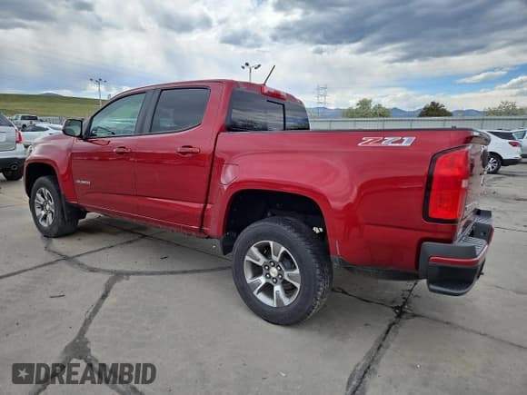 ✅ 2019 Chevrolet Colorado 4WD Z71 • VIN: 1GCGTDEN7K1315926 • Лот: 52732115. Опубликован ранее на Copart с пробегом 125 504 миль. Бесплатный доступ к архиву аукционных продаж из США и подробный отчёт об истории автомобиля на DreamBid. Изображение 2.