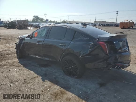 ✅ 2022 Cadillac CT5-V • VIN: 1G6DV5RW9N0108571 • Лот: 68798914. Опубликован ранее на Copart с пробегом 50 671 миль. Бесплатный доступ к архиву аукционных продаж из США и подробный отчёт об истории автомобиля на DreamBid. Изображение 2.