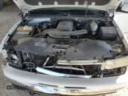 ✅ 2003 Chevrolet Suburban LT • VIN: 3GNFK16Z33G218425 • Lot: 81138144. Listed on Copart with 246,985 mi. Free auction sales archive from the USA and detailed vehicle history report at DreamBid. Image 14.