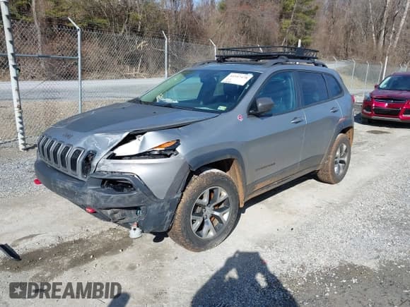✅ 2016 Jeep Cherokee Trailhawk • VIN: 1C4PJMBB6GW335837 • Lot: 41547478. Listed on IAAI with 236,483 mi. Free auction sales archive from the USA and detailed vehicle history report at DreamBid. Image 2.